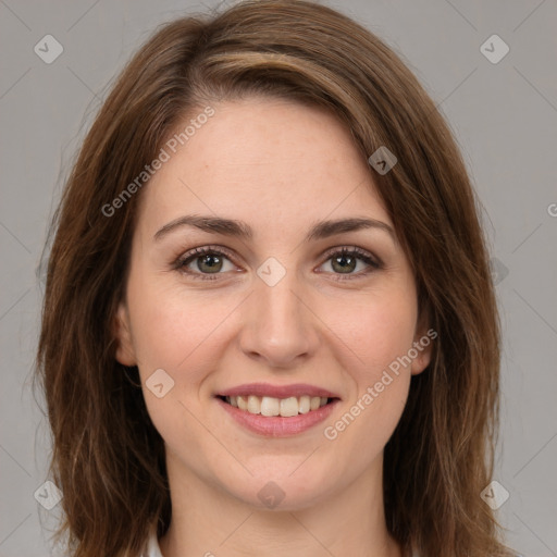 Joyful white young-adult female with medium  brown hair and green eyes