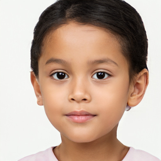 Joyful latino child female with short  brown hair and brown eyes