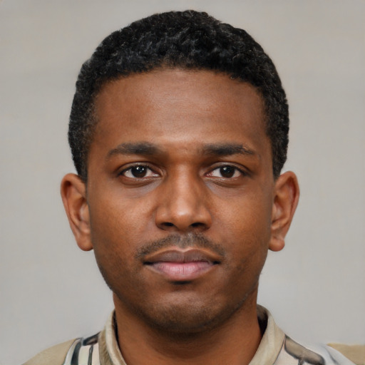 Neutral latino young-adult male with short  brown hair and brown eyes