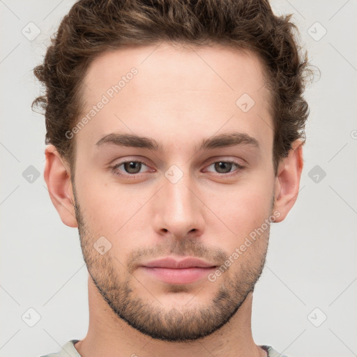 Neutral white young-adult male with short  brown hair and grey eyes