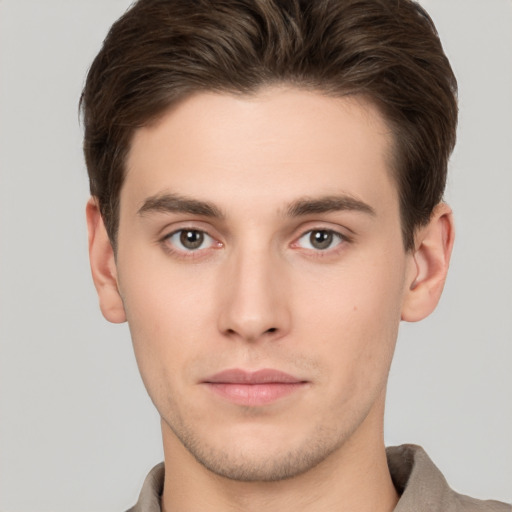 Neutral white young-adult male with short  brown hair and brown eyes