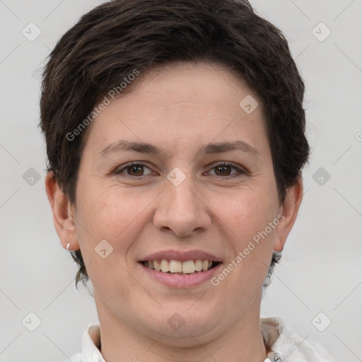 Joyful white young-adult female with short  brown hair and brown eyes