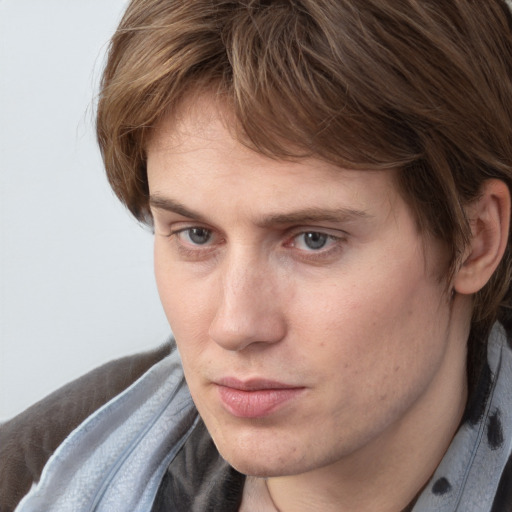 Neutral white young-adult male with medium  brown hair and brown eyes