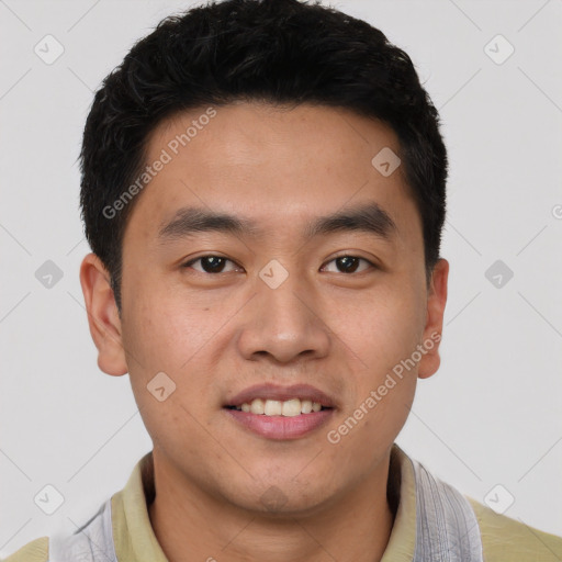 Joyful latino young-adult male with short  brown hair and brown eyes