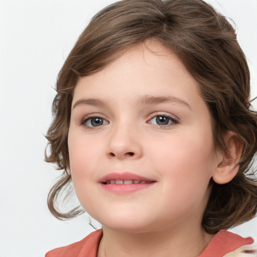 Joyful white child female with medium  brown hair and grey eyes