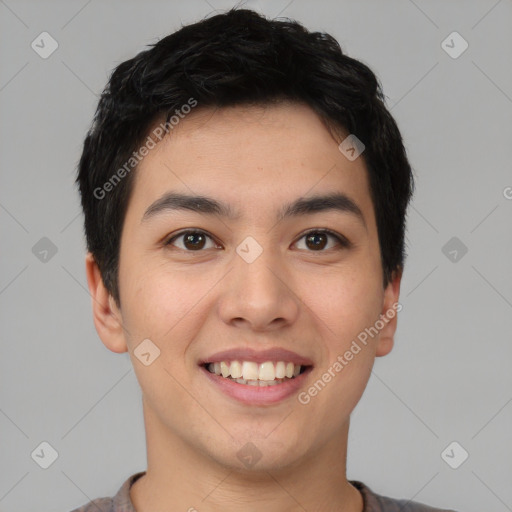 Joyful asian young-adult male with short  black hair and brown eyes