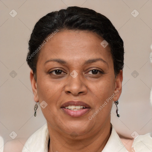 Joyful latino adult female with short  brown hair and brown eyes