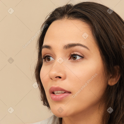 Neutral white young-adult female with long  brown hair and brown eyes