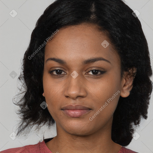 Joyful black young-adult female with medium  black hair and brown eyes