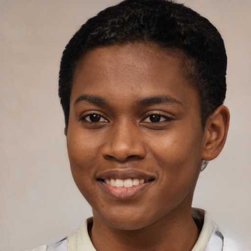 Joyful black young-adult female with short  black hair and brown eyes