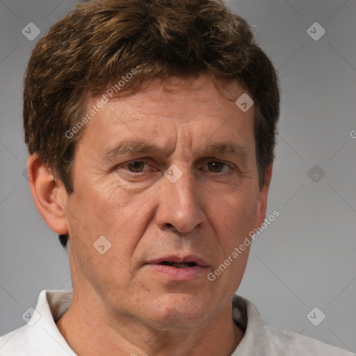 Neutral white middle-aged male with short  brown hair and brown eyes