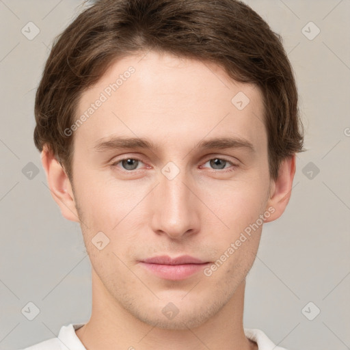 Neutral white young-adult male with short  brown hair and grey eyes