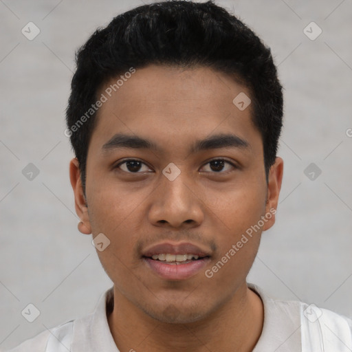 Joyful latino young-adult male with short  black hair and brown eyes