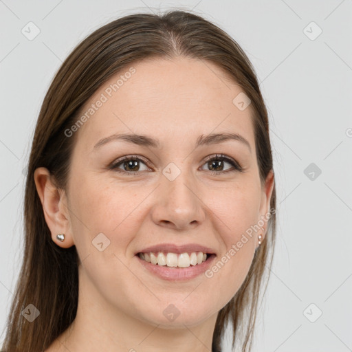 Joyful white young-adult female with long  brown hair and grey eyes