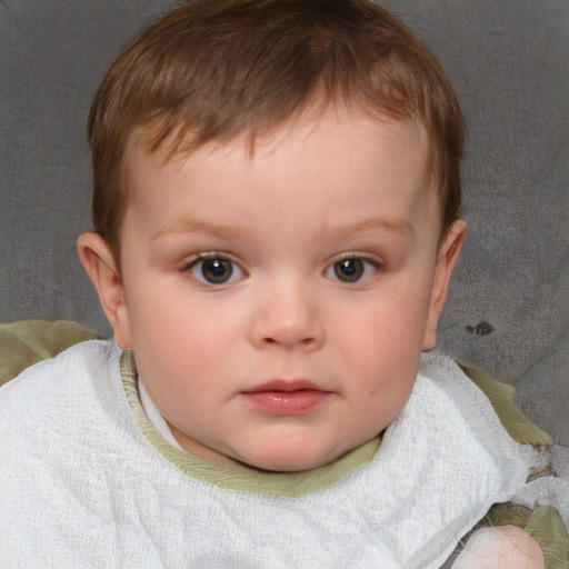 Neutral white child male with short  brown hair and blue eyes