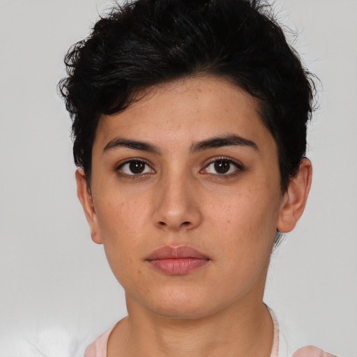 Neutral white young-adult female with short  brown hair and brown eyes