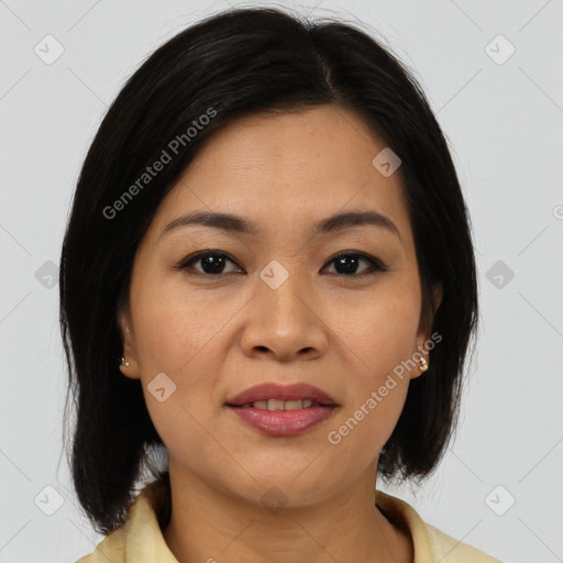 Joyful asian young-adult female with medium  brown hair and brown eyes