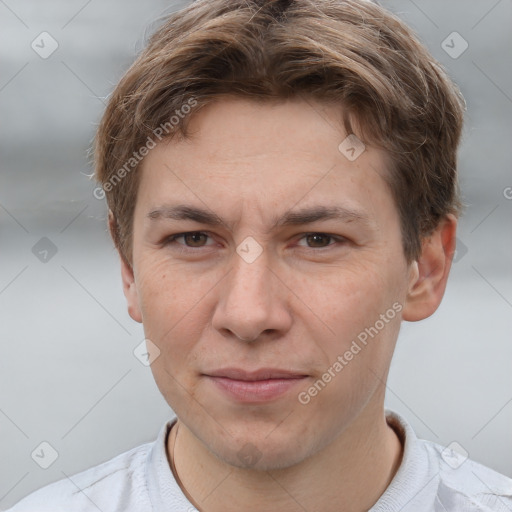 Joyful white adult male with short  brown hair and grey eyes