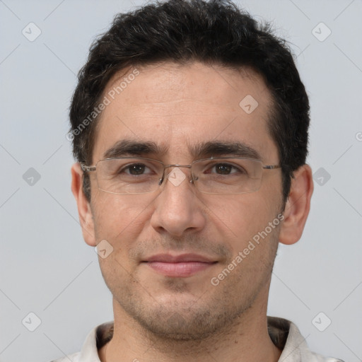 Joyful white adult male with short  brown hair and brown eyes