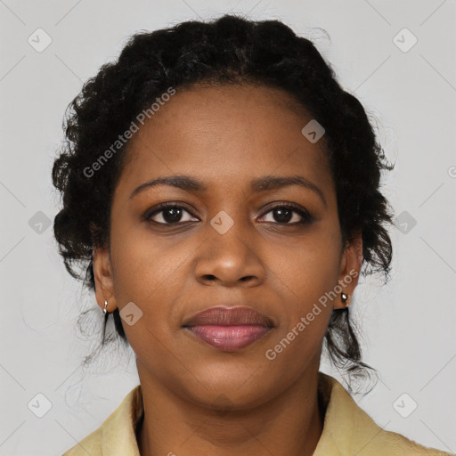 Joyful black young-adult female with medium  black hair and brown eyes