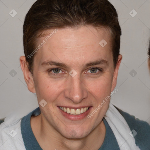 Joyful white adult female with short  brown hair and grey eyes