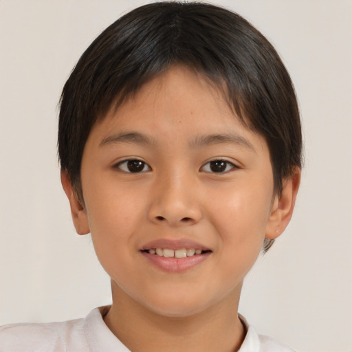 Joyful asian child female with short  brown hair and brown eyes