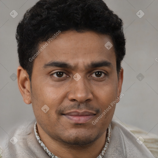 Joyful latino young-adult male with short  brown hair and brown eyes