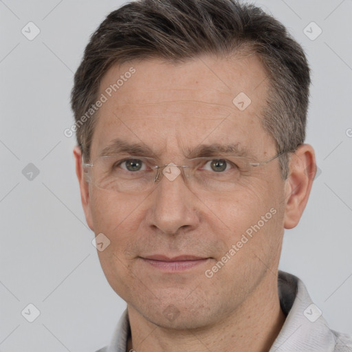 Joyful white middle-aged male with short  brown hair and brown eyes