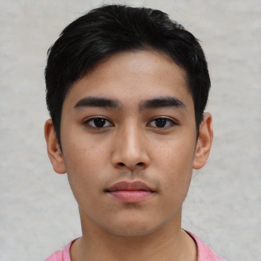 Neutral latino young-adult male with short  black hair and brown eyes