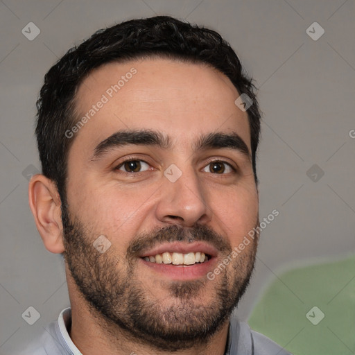 Joyful white young-adult male with short  black hair and brown eyes