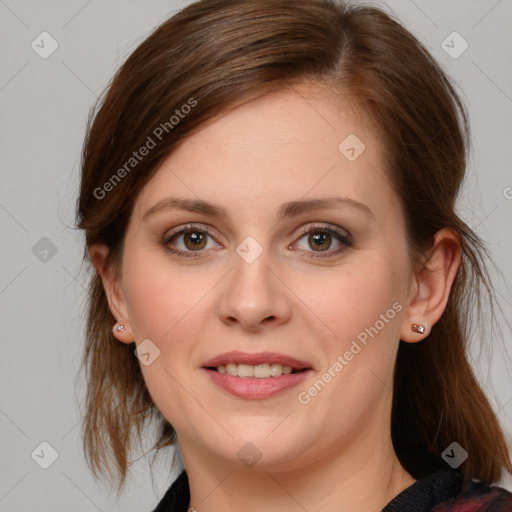 Joyful white young-adult female with medium  brown hair and blue eyes