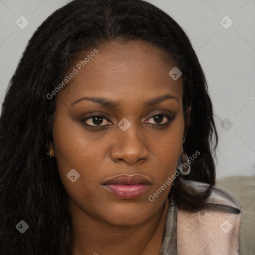 Joyful black young-adult female with long  brown hair and brown eyes