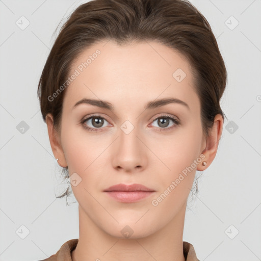 Neutral white young-adult female with long  brown hair and brown eyes