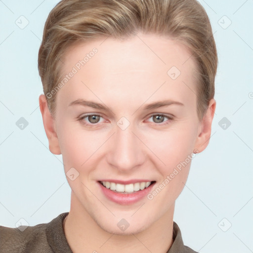 Joyful white young-adult female with short  brown hair and grey eyes