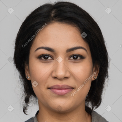 Joyful latino young-adult female with medium  black hair and brown eyes