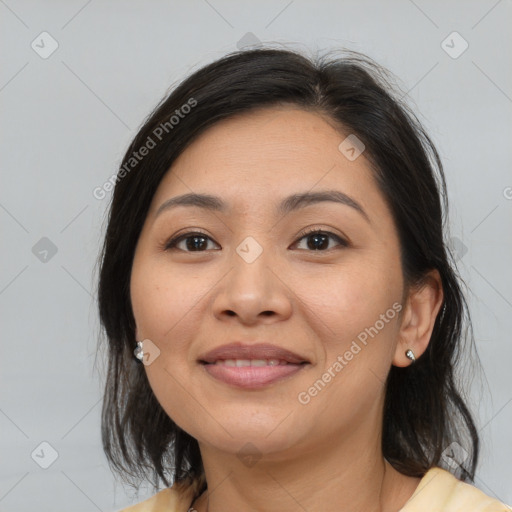 Joyful asian young-adult female with medium  brown hair and brown eyes