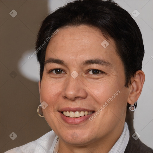 Joyful white adult female with short  brown hair and brown eyes