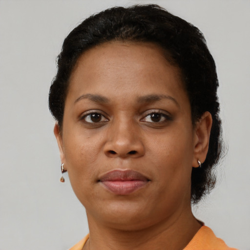 Neutral black young-adult female with short  brown hair and brown eyes