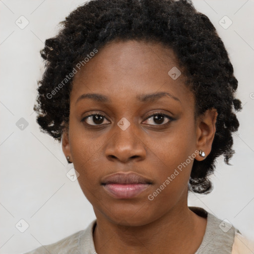 Neutral black young-adult female with short  brown hair and brown eyes