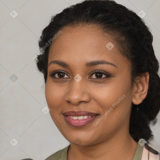 Joyful black young-adult female with medium  black hair and brown eyes