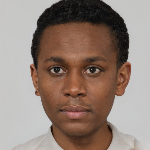 Neutral black young-adult male with short  brown hair and brown eyes