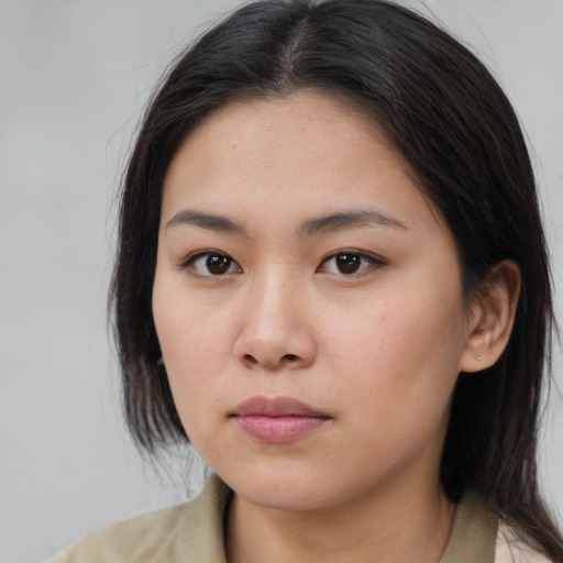 Neutral asian young-adult female with medium  brown hair and brown eyes