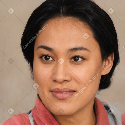 Joyful asian young-adult female with medium  black hair and brown eyes