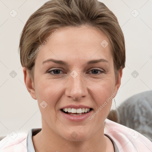 Joyful white young-adult female with short  brown hair and grey eyes