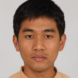 Neutral asian young-adult male with short  brown hair and brown eyes