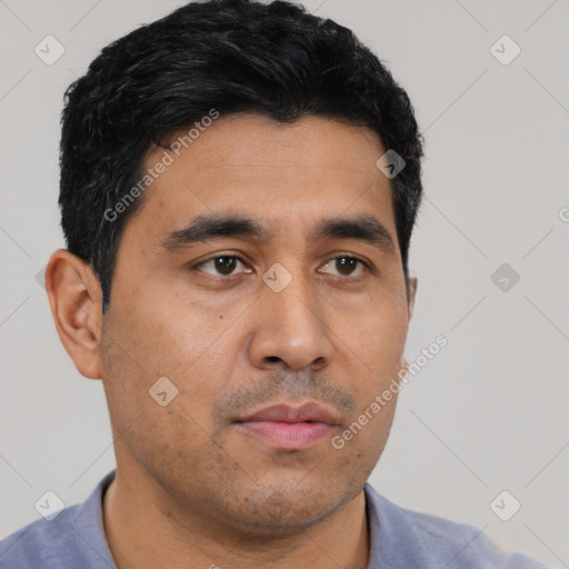 Neutral latino young-adult male with short  black hair and brown eyes