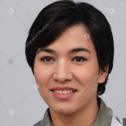 Joyful asian young-adult female with medium  black hair and brown eyes