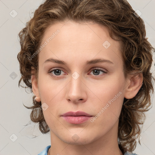 Neutral white young-adult female with medium  brown hair and green eyes