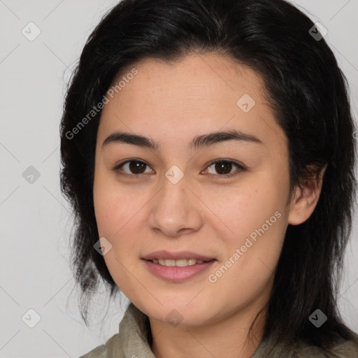 Joyful latino young-adult female with medium  brown hair and brown eyes