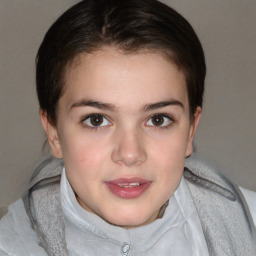 Joyful white child female with short  brown hair and brown eyes